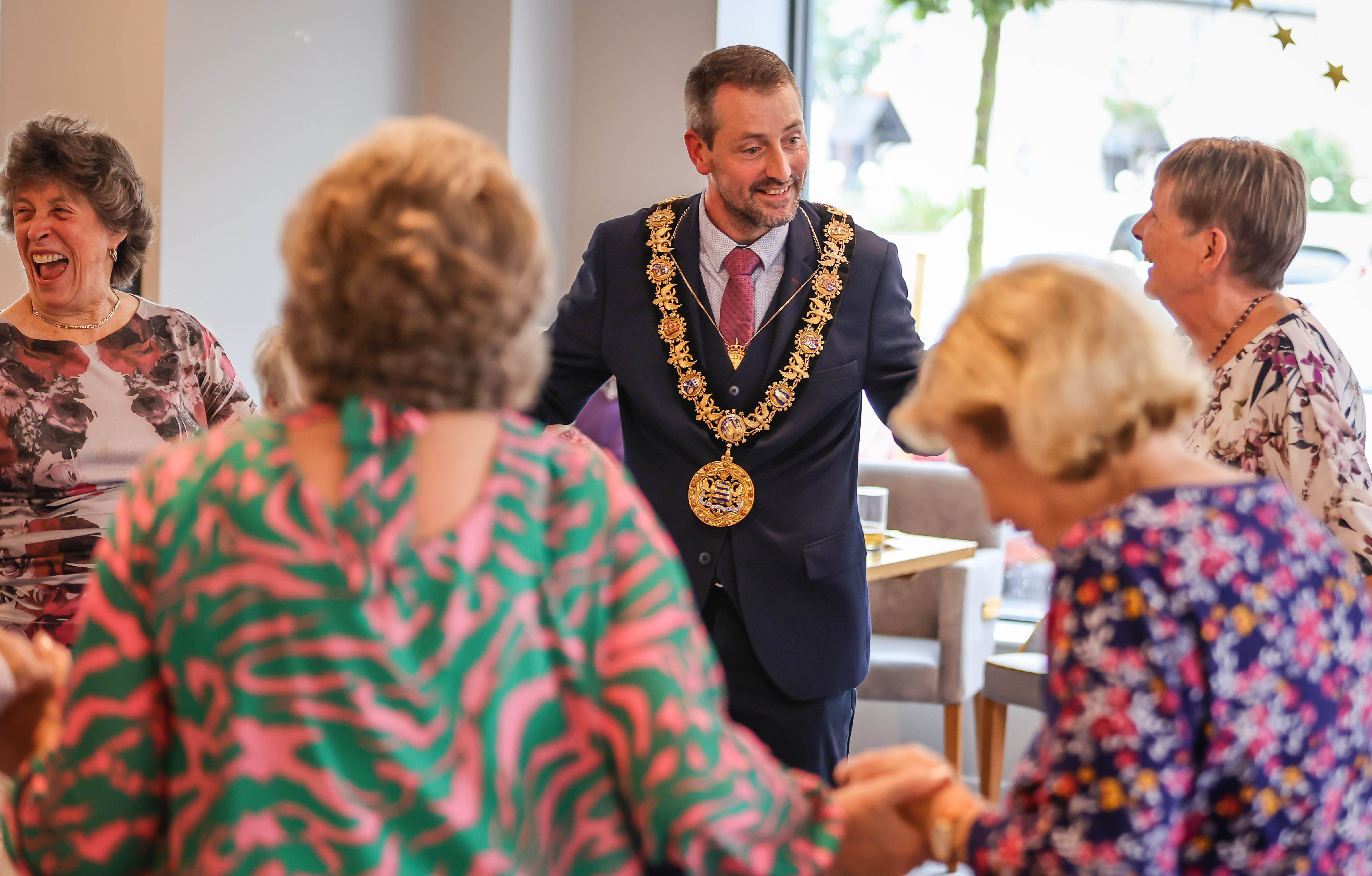 Platinum Skies Chapters homeowners dancing with the Mayor of Salisbury