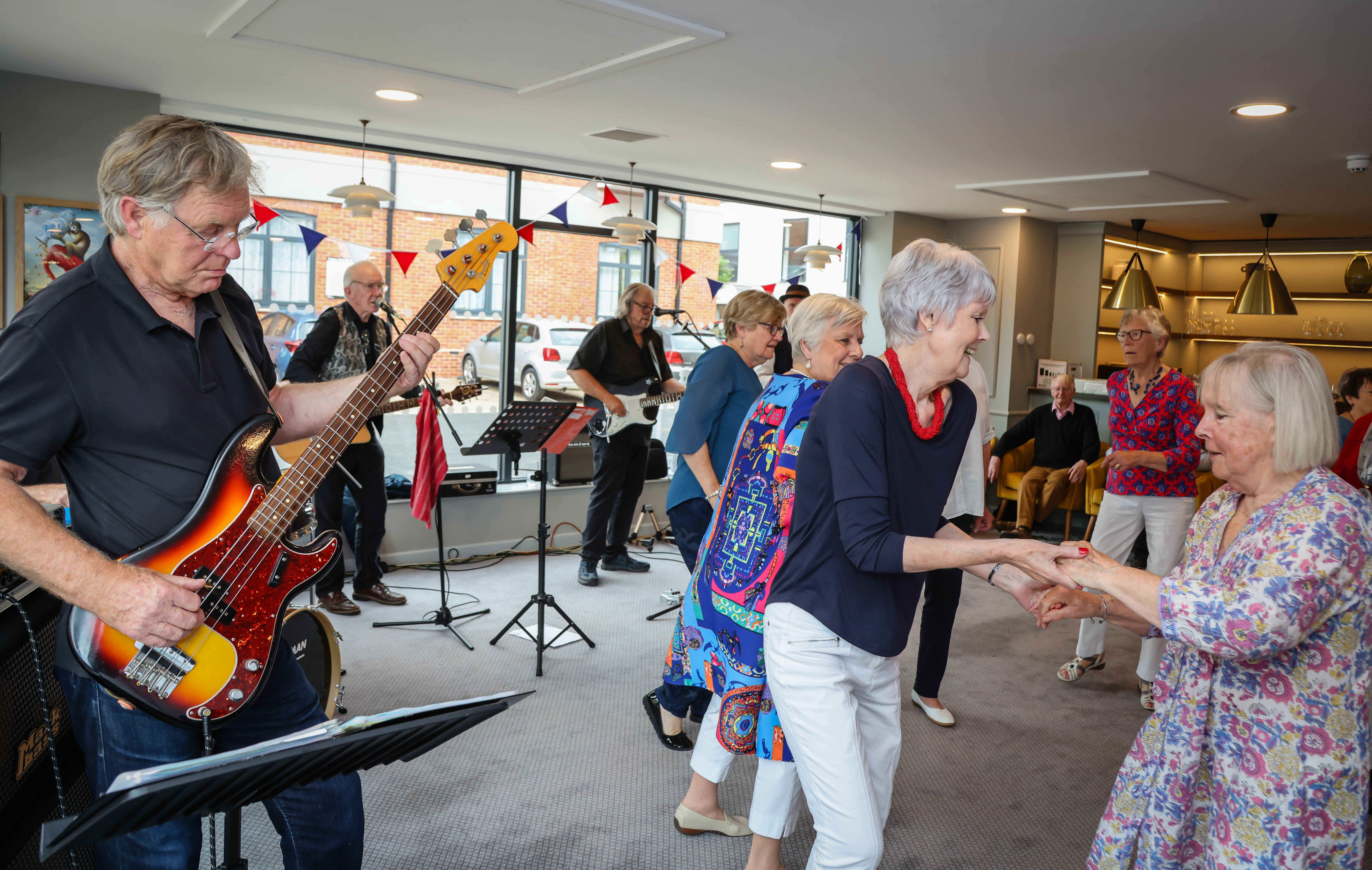 residents singing and dancing to the music at jubilee party