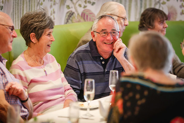 Residents enjoying a drink together 
